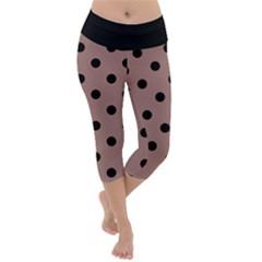 Large Black Polka Dots On Burnished Brown - Lightweight Velour Capri Yoga Leggings by FashionLane