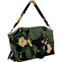 Tropical Vintage Yellow Hibiscus Floral Green Leaves Seamless Pattern Black Background  Canvas Crossbody Bag by Sobalvarro